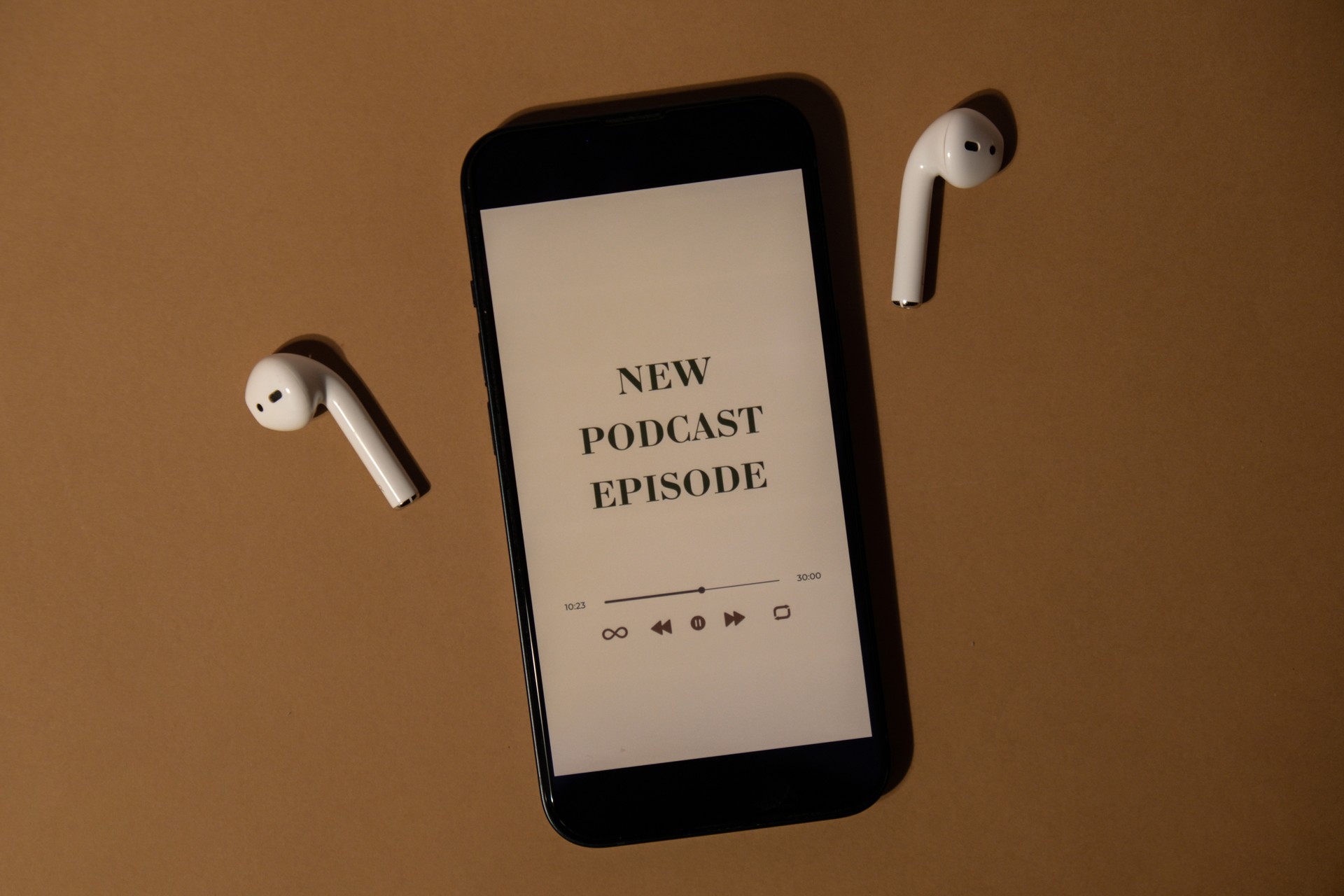 Wireless headphones and mobile phone NEW PODCAST EPISODE listening website page app application. Audio healing, sound therapy wellness rituals, positive mental health habits